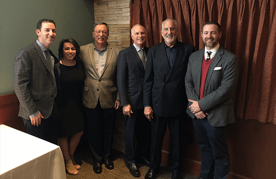 Jacobs, Schwalbe & Petruzzelli attorneys at 2019 holiday party